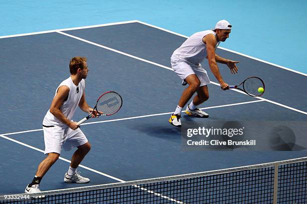 Lukasz Kubot of Poland plays with Oliver Marach of Austria during the men's doubles first round match against Lukas Dlouhy of Czech Republic and...