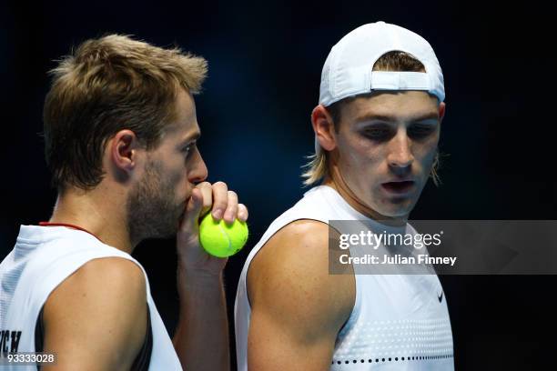 Lukasz Kubot of Poland talks to Oliver Marach of Austria during the men's doubles first round match against Lukas Dlouhy of Czech Republic and...