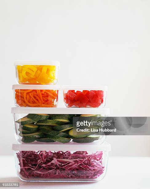 storage containers , and cut vegetables - hubbard squash stock-fotos und bilder