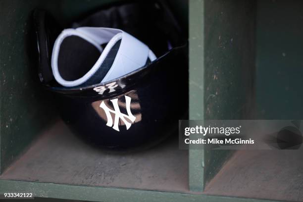 New York Yankees batting helmet in the dugout during the Spring Training game against the Baltimore Orioles at Spectrum Field on March 14, 2018 in...