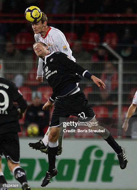 Christian Stuff of Berlin and Adam Nemec of Kaiserslautern jump for a header during the Second Bundesliga match between 1. FC Union Berlin and 1. FC...