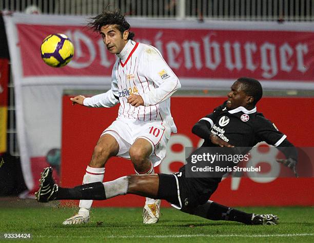 Huezeyfe Dogan of Berlin battles for the ball with Georges Mandjeck of Kaiserslautern during the Second Bundesliga match between 1. FC Union Berlin...