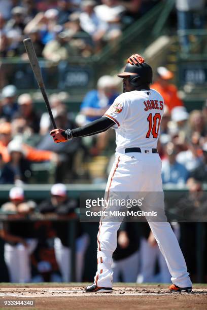 Adam Jones of the Baltimore Orioles gets ready for the next pitch during the Spring Training game against the New York Yankees at Spectrum Field on...