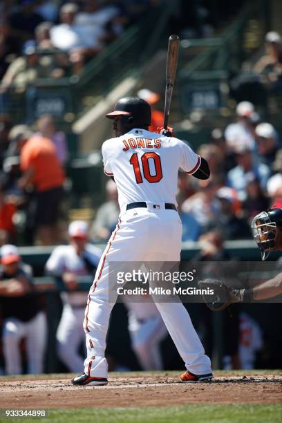 Adam Jones of the Baltimore Orioles gets ready for the next pitch during the Spring Training game against the New York Yankees at Spectrum Field on...