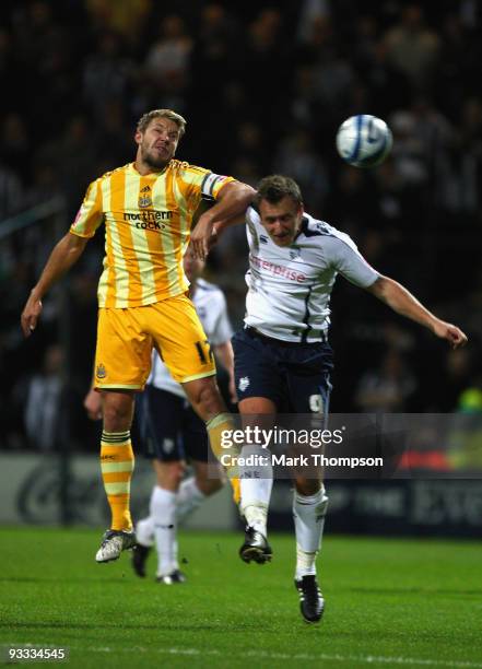 Chris Brown of Preston battles with Alan Smith of Newcastle United during the Coca-Cola Championship match between Preston North End and Newcastle...