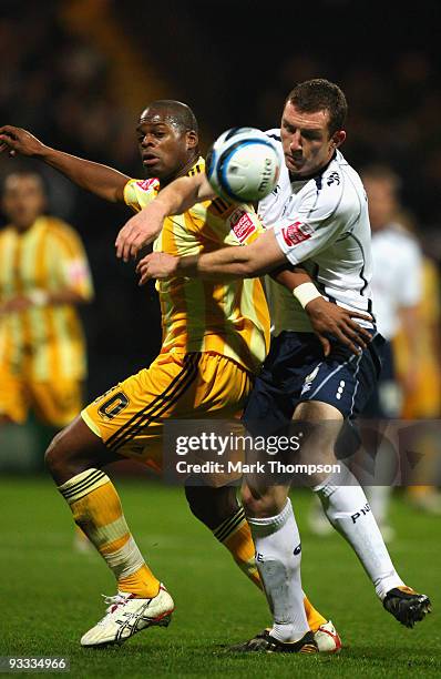 Neill Collins of Preston battles with Marlon Harewood of Newcastle United during the Coca-Cola Championship match between Preston North End and...