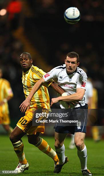 Neill Collins of Preston battles with Marlon Harewood of Newcastle United during the Coca-Cola Championship match between Preston North End and...