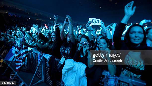 Fans cheer while the US American boy group Backstreet Boys performs live during a concert at the O2 World on November 23, 2009 in Berlin, Germany....