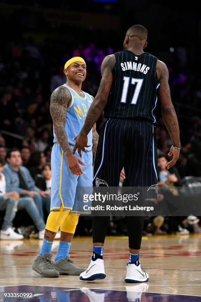 Isaiah Thomas of the Los Angeles Lakers argues with Jonathon Simmons of the Orlando Magic on March 7, 2018 at STAPLES Center in Los Angeles,...