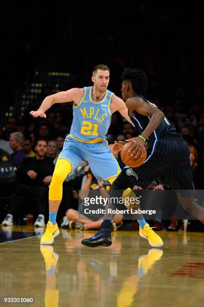 Jonathan Isaac of the Orlando Magic plays against Travis Wear of the Los Angeles Lakers on March 7, 2018 at STAPLES Center in Los Angeles,...
