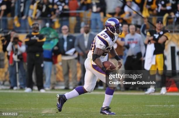 Running back Adrian Peterson of the Minnesota Vikings runs the football against the Pittsburgh Steelers during a game at Heinz Field on October 25,...