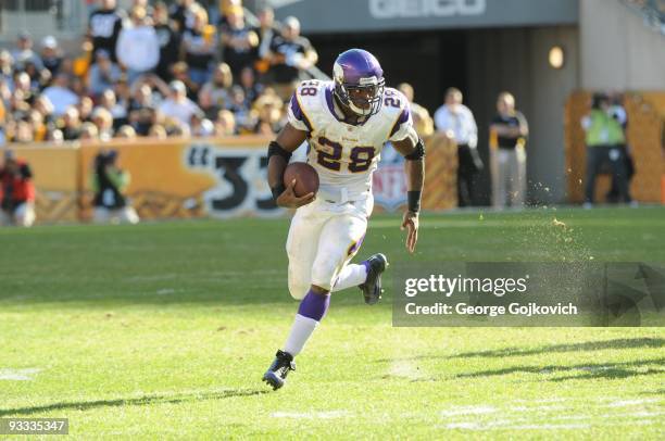 Running back Adrian Peterson of the Minnesota Vikings runs the football against the Pittsburgh Steelers during a game at Heinz Field on October 25,...