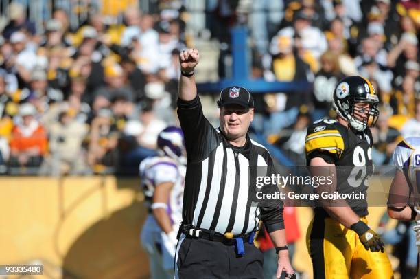 National Football League umpire Bill Schuster gestures during a game between the Minnesota Vikings and Pittsburgh Steelers at Heinz Field on October...