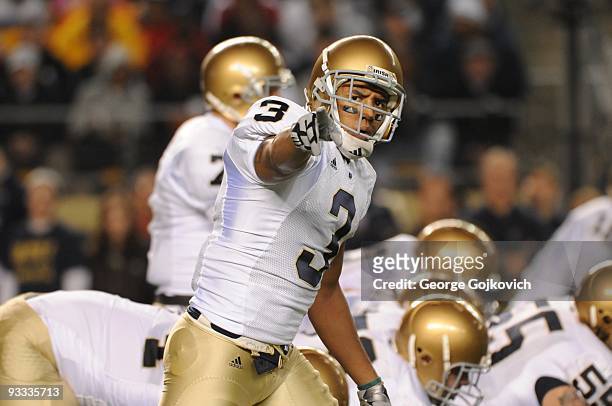 Wide receiver Michael Floyd of the Notre Dame Fighting Irish signals at the line of scrimmage during a college football game against the University...