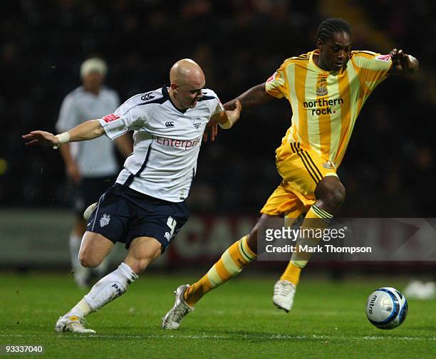 Richard Chaplow of Preston battles with Nile Ranger of Newcastle United during the Coca-Cola Championship match between Preston North End and...