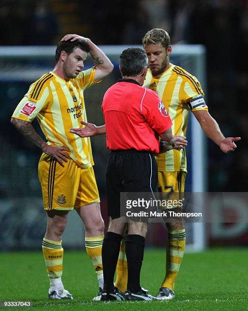Alan Smith of Newcastle United argues with referee Scott Mathieson during the Coca-Cola Championship match between Preston North End and Newcastle...