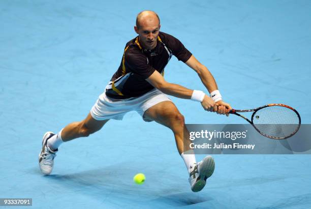 Nikolay Davydenko of Russia returns the ball during the men's singles first round match against Novak Djokovic of Serbia during the Barclays ATP...