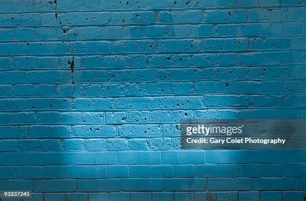 blue brick wall - gary colet stock pictures, royalty-free photos & images