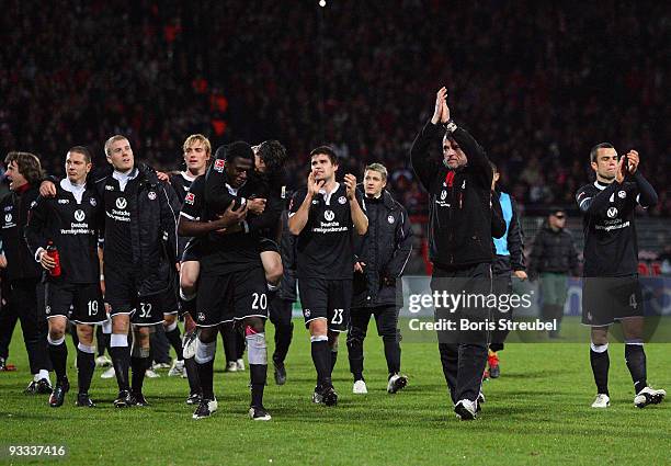 The team of Kaiserslautern and head coach Marco Kurz celebrate after winning the Second Bundesliga match between 1. FC Union Berlin and 1. FC...