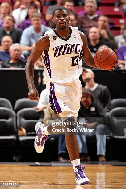 Tyreke Evans of the Sacramento Kings moves the ball up court during the game against the Oklahoma City Thunder at Arco Arena on November 10, 2009 in...
