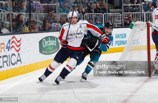 Nicklas Backstrom of the Washington Capitals skates against Barclay Goodrow of the San Jose Sharks at SAP Center on March 10, 2018 in San Jose,...