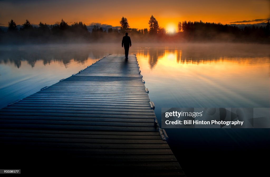 Misty lake sunrise in paradise
