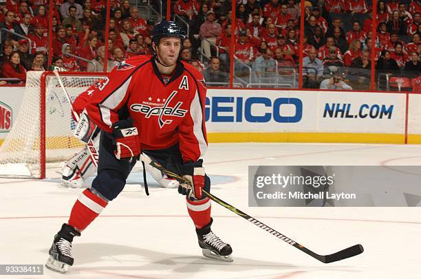 Tom Poti of the Washington Capitals looks on during a NHL hockey game against the Minnesota WIld on November 13, 2009 at the Verizon Center in...