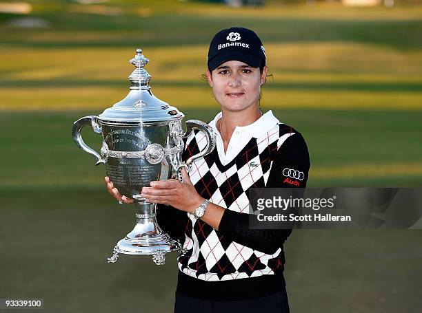 Lorena Ochoa of Mexico poses with her Player of the Year trophy after the final round of the LPGA Tour Championship presented by Rolex at the...