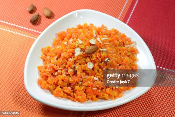 carrot halwa - north indian food stock pictures, royalty-free photos & images