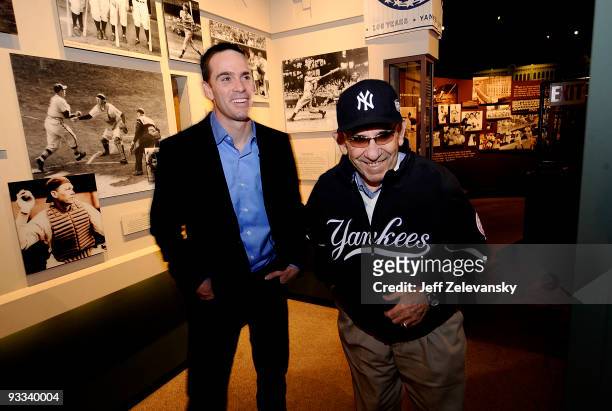Baseball Hall of Famer Yogi Berra and four-time Nascar champion Jimmie Johnson tour the Yogi Berra Museum and and Learning Center on November 23,...