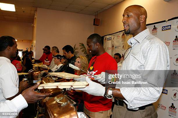 Alonzo Mourning of the Miami Heat participates in the Miami Heat's Annual Thanksgiving in Overtown Ceremony on November 23, 2009 at the Miami Rescue...