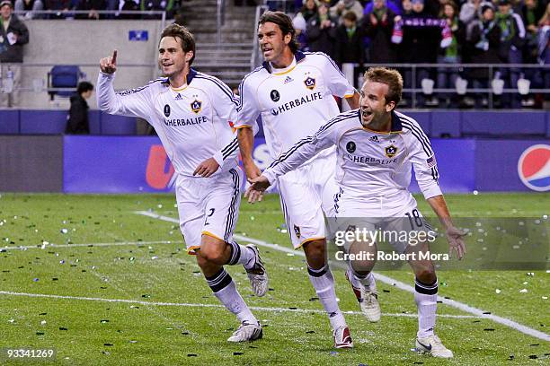 Todd Dunivant, Jovan Kirovski, and Mike Magee of the Los Angeles Galaxy celebrate a goal against Real Salt Lake during their MLS Cup game at Qwest...