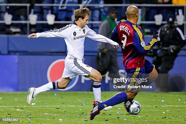 Mike Magee of the Los Angeles Galaxy puts a shot past the defense of Real Salt Lake during their MLS Cup game at Qwest Field on November 22, 2009 in...