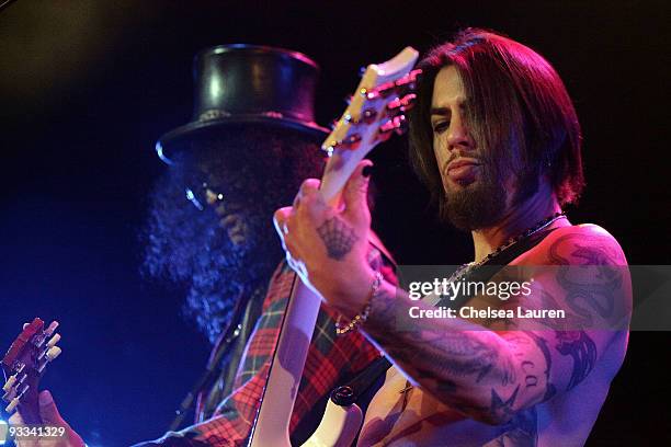 Guitarists Slash of Velvet Revolver and Dave Navarro of Jane's Addiction perform at the Los Angeles Youth Network benefit rock concert at Avalon on...