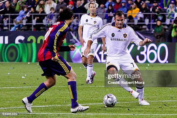 Chris Klein of the Los Angeles Galaxy controls the ball pas the defense of Real Salt Lake during their MLS Cup game at Qwest Field on November 22,...