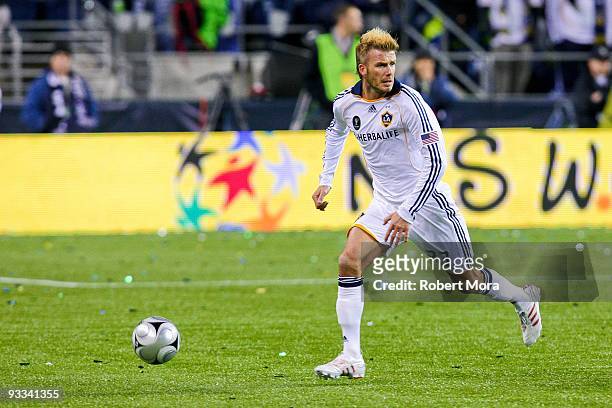 David Beckham of the Los Angeles Galaxy attacks the defense of Real Salt Lake during their MLS Cup game at Qwest Field on November 22, 2009 in...