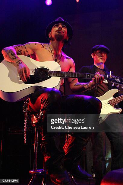 Guitarist Dave Navarro of Jane's Addiction bassist Chris Chaney perform at the Los Angeles Youth Network benefit rock concert at Avalon on November...