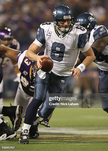 Matt Hasselbeck of the Seattle Seahawks drops back against the Minnesota Vikings at Hubert H. Humphrey Metrodome on November 22, 2009 in Minneapolis,...