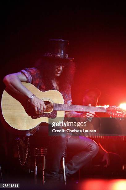 Guitarists Slash of Velvet Revolver and Tom Morello of Street Sweeper Social Club perform at the Los Angeles Youth Network benefit rock concert at...