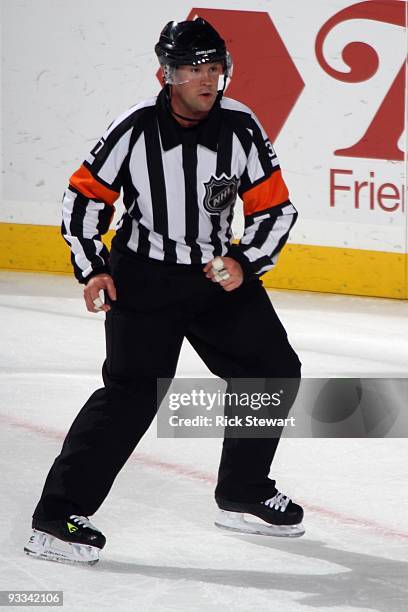 Referee Kyle Rehman looks on during the Florida Panthers game against the Buffalo Sabres at HSBC Arena on November 18, 2009 in Buffalo, New York.