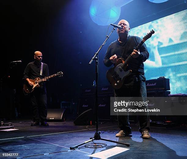 Musician Joey Santiago and singer/musician Frank Blackl of The Pixies perform at Hammerstein Ballroom on November 23, 2009 in New York City.