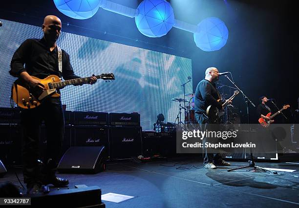 Musician Joey Santiago, singer/musician Frank Black, musician David Lovering, and singer/musician Kim Deal of The Pixies perform at Hammerstein...