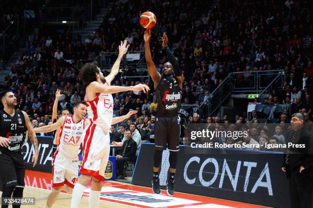 Michael Umeh and Pietro Aradori of Segafredo competes with Dairis Bertans and Davide Pascolo of EA7 during the LBA LegaBasket of Serie A match...