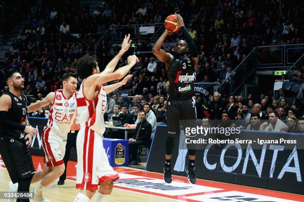 Michael Umeh and Pietro Aradori of Segafredo competes with Dairis Bertans and Davide Pascolo of EA7 during the LBA LegaBasket of Serie A match...