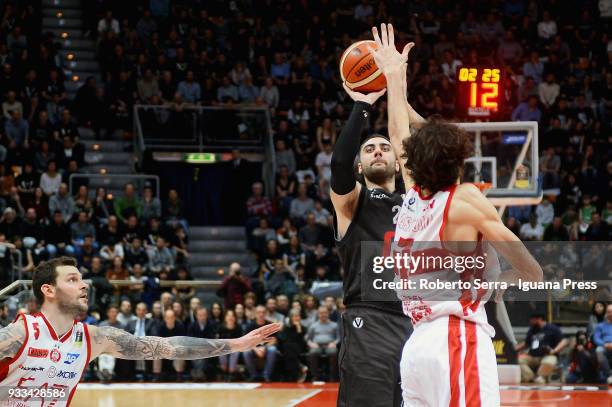 Pietro Aradori of Segafredo competes with Davide Pascolo of EA7 during the LBA LegaBasket of Serie A match between Virtus Segafredo Bologna and...