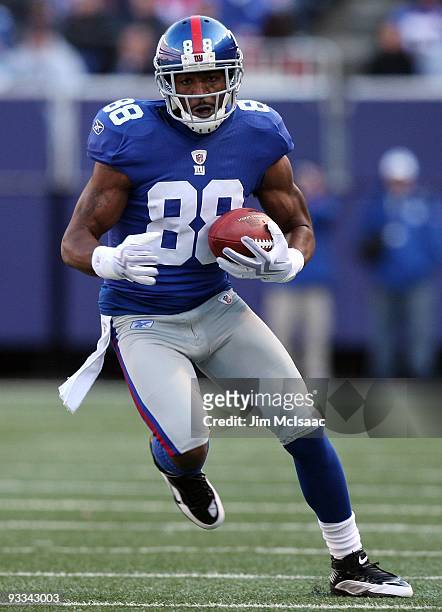 Hakeem Nicks of the New York Giants runs the ball after a catch late in the first half against the Atlanta Falcons on November 22, 2009 at Giants...