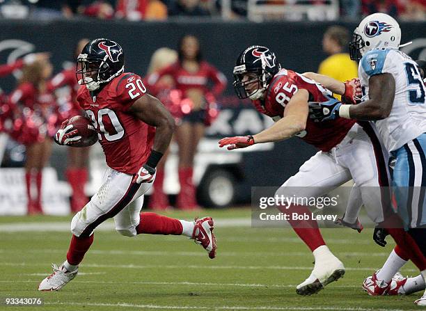 Running back Steve Slaton of the Houston Texans receives a block from tight-end Joel Dreessen as he rushes in the first quarter against the Tennessee...