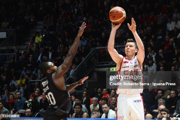 Dairis Bertans of EA7 competes with Oliver Lafayette of Segafredo during the LBA LegaBasket of Serie A match between Virtus Segafredo Bologna and...