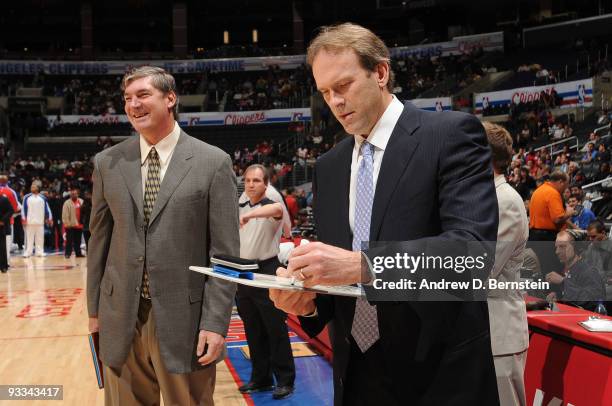 Assistant Coach Bill Laimbeer and Head Coach Kurt Rambis of the Minnesota Timberwolves look on before a game against the Los Angeles Clippers at...