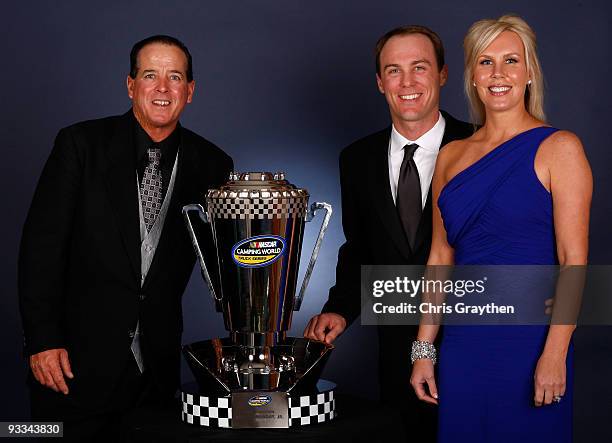 Ron Hornaday Jr., 2009 Camping World Truck Series Champion, poses with team owners Kevin Harvick and DeLana Harvick during the NASCAR...